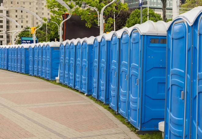 a row of portable restrooms at a trade show, catering to visitors with a professional and comfortable experience in Brierfield, AL